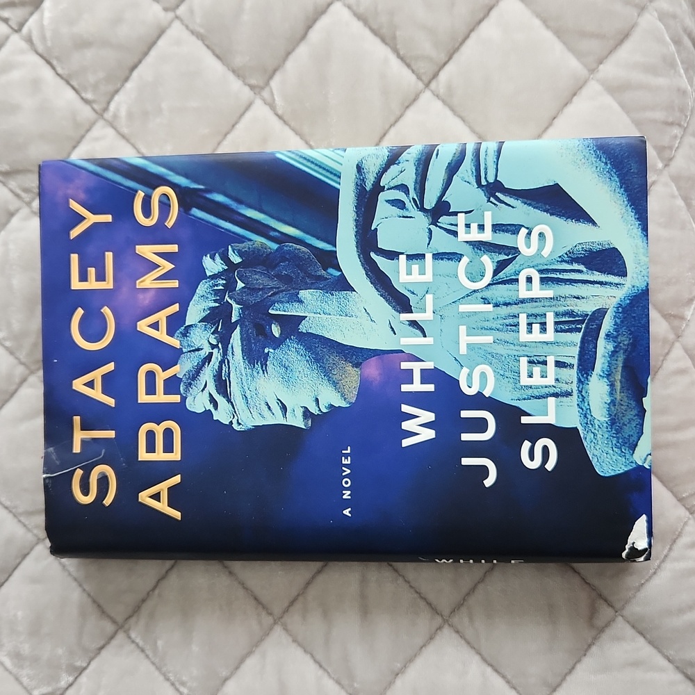While Justice Sleeps by Stacey Abrams